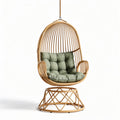 Hangstoel van rotan met groene kussensmaat 80 x 70 x 120cm